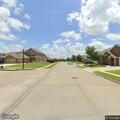 Confused woman checked at bus stop in Forney