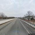 Vehicle hit deer on parkway shoulder