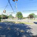 Traffic light flashing yellow at Broadway and Maria Court