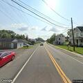 Flatbed truck rollover crash on MD 302