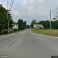 Vehicle stopped near deer on Monroe Highway