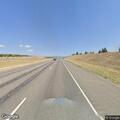 Two semis against barrier on I-90 eastbound