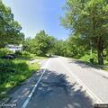Person slumped over in vehicle on Litchfield Road