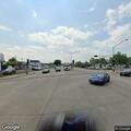 Motorcycles racing and doing tricks on Central Avenue