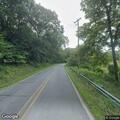 Canopy hanging over road prompts county response