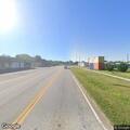 Officer checks three-axle truck on US 76