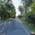 Telephone pole fire spreading to nearby trees
