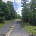 Motorcycle and pickup crash injures rider