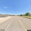 Person walking in road stopping traffic in Akron
