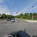 Traffic stop involving silver Cadillac sedan