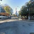 Traffic lights flashing red at downtown intersection