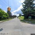 Crash damages utility pole and traffic lights