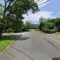 Person feeling unwell at intersection in Great Neck