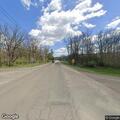 Pickup with trailer swerving on County Route 64