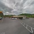 Vehicle stopped in traffic near Shell gas station