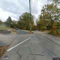 Large tree branch blocking part of roadway