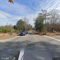 Person experiencing abdominal pain at Mineral Springs Road