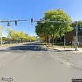 Pedestrian walking in middle of road causes hazard