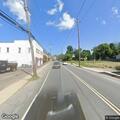 Car fire next to building on Glen Cove Avenue