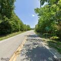 Abandoned vehicle off roadway on Leitchfield Road