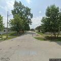 Traffic stop on silver GMC near school patrol