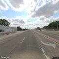 Vehicle stopped in travel lane on Highway 385