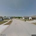 Male lying in grass near bike checked on Veterans Drive