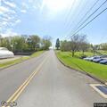 Traffic stop on black Chevy Equinox near school
