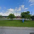 Man found lying outside Mooers post office