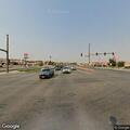 Traffic stop on tan Volkswagen near intersection