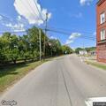Gray SUV hits fire hydrant on Main Street and leaves
