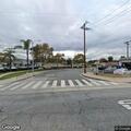 Person experiencing chest pain at bus stop in Glendora