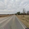 Hay bale briefly blocks Highway 7 near Snelling Drive