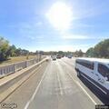 Driving complaint for white Chevy Suburban on highway