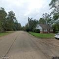 Elderly woman fallen in front yard near Magee