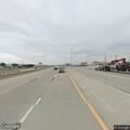 Driver and passenger fighting in car on turnpike