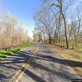 Tree partially blocking highway near Campti