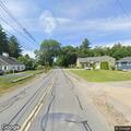 Smoke reported from hood of black Suburban