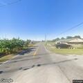 Traffic stop on white GMC Yukon in Galliano