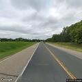 Pedestrian walking on interstate near Manning