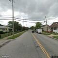 Suspicious cardboard box with straw found on porch near Watt St