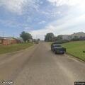 Driver flees stop and crashes at traffic circle
