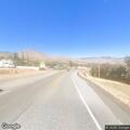 Person running in and out of traffic on Highway 155