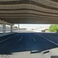 Coils fall from trailer and block highway interchange