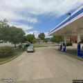 Man reports being robbed at gunpoint outside store