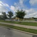 Person experiencing dizziness at parking lot in Rockwall TX