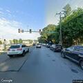 Officer with disabled vehicle at intersection