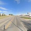 Woman sitting on highway creates traffic hazard