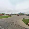 Traffic stop of silver Pontiac at gas station