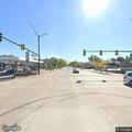 Elderly male lying in grass at 12 Mile and Coolidge